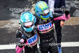 Esteban Ocon (FRA) Alpine F1 Team (Right) celebrates his second position with third placed team mate Pierre Gasly (FRA) Alpine F1 Team in parc ferme. 03.11.2024. Formula 1 World Championship, Rd 21, Brazilian Grand Prix, Sao Paulo, Brazil, Race Day.