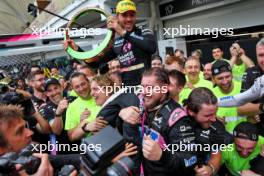 Pierre Gasly (FRA) Alpine F1 Team celebrates his third position with the team. 03.11.2024. Formula 1 World Championship, Rd 21, Brazilian Grand Prix, Sao Paulo, Brazil, Race Day.