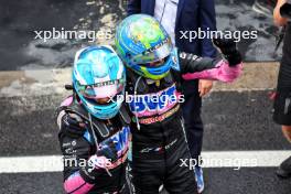 Esteban Ocon (FRA) Alpine F1 Team (Right) and Pierre Gasly (FRA) Alpine F1 Team celebrate a 2-3 finish in parc ferme. 03.11.2024. Formula 1 World Championship, Rd 21, Brazilian Grand Prix, Sao Paulo, Brazil, Race Day.