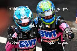 (L to R): Pierre Gasly (FRA) Alpine F1 Team celebrates his third position with second placed team mate Esteban Ocon (FRA) Alpine F1 Team in parc ferme. 03.11.2024. Formula 1 World Championship, Rd 21, Brazilian Grand Prix, Sao Paulo, Brazil, Race Day.