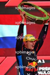 Race winner Max Verstappen (NLD) Red Bull Racing celebrates on the podium. 03.11.2024. Formula 1 World Championship, Rd 21, Brazilian Grand Prix, Sao Paulo, Brazil, Race Day.