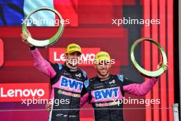 (L to R): Esteban Ocon (FRA) Alpine F1 Team celebrates his second position on the podium with third placed team mate Pierre Gasly (FRA) Alpine F1 Team. 03.11.2024. Formula 1 World Championship, Rd 21, Brazilian Grand Prix, Sao Paulo, Brazil, Race Day.