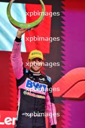 Pierre Gasly (FRA) Alpine F1 Team celebrates his third position on the podium. 03.11.2024. Formula 1 World Championship, Rd 21, Brazilian Grand Prix, Sao Paulo, Brazil, Race Day.