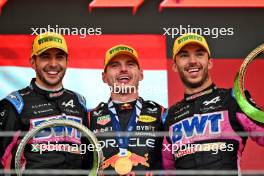 The podium (L to R): Esteban Ocon (FRA) Alpine F1 Team, second; Max Verstappen (NLD) Red Bull Racing, race winner; Pierre Gasly (FRA) Alpine F1 Team, third. 03.11.2024. Formula 1 World Championship, Rd 21, Brazilian Grand Prix, Sao Paulo, Brazil, Race Day.