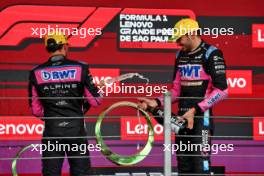 (L to R): Pierre Gasly (FRA) Alpine F1 Team celebrates his third position on the podium with second placed Esteban Ocon (FRA) Alpine F1 Team on the podium. 03.11.2024. Formula 1 World Championship, Rd 21, Brazilian Grand Prix, Sao Paulo, Brazil, Race Day.