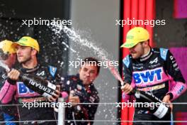 (L to R): Pierre Gasly (FRA) Alpine F1 Team celebrates his third position on the podium with second placed team mate Esteban Ocon (FRA) Alpine F1 Team. 03.11.2024. Formula 1 World Championship, Rd 21, Brazilian Grand Prix, Sao Paulo, Brazil, Race Day.