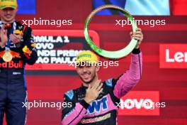 Pierre Gasly (FRA) Alpine F1 Team celebrates his third position on the podium. 03.11.2024. Formula 1 World Championship, Rd 21, Brazilian Grand Prix, Sao Paulo, Brazil, Race Day.