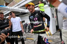 Pierre Gasly (FRA) Alpine F1 Team celebrates his third position with the team. 03.11.2024. Formula 1 World Championship, Rd 21, Brazilian Grand Prix, Sao Paulo, Brazil, Race Day.