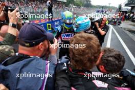 Esteban Ocon (FRA) Alpine F1 Team and Pierre Gasly (FRA) Alpine F1 Team celebrate a 2-3 finish in parc ferme. 03.11.2024. Formula 1 World Championship, Rd 21, Brazilian Grand Prix, Sao Paulo, Brazil, Race Day.