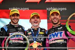 The podium (L to R): Esteban Ocon (FRA) Alpine F1 Team, second; Max Verstappen (NLD) Red Bull Racing, race winner; Pierre Gasly (FRA) Alpine F1 Team, third. 03.11.2024. Formula 1 World Championship, Rd 21, Brazilian Grand Prix, Sao Paulo, Brazil, Race Day.