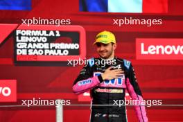 Esteban Ocon (FRA) Alpine F1 Team celebrates his second position on the podium. 03.11.2024. Formula 1 World Championship, Rd 21, Brazilian Grand Prix, Sao Paulo, Brazil, Race Day.