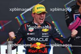 Race winner Max Verstappen (NLD) Red Bull Racing celebrates on the podium. 03.11.2024. Formula 1 World Championship, Rd 21, Brazilian Grand Prix, Sao Paulo, Brazil, Race Day.