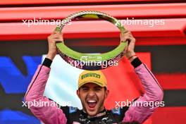 Esteban Ocon (FRA) Alpine F1 Team celebrates his second position on the podium. 03.11.2024. Formula 1 World Championship, Rd 21, Brazilian Grand Prix, Sao Paulo, Brazil, Race Day.