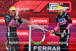 (L to R): Pierre Gasly (FRA) Alpine F1 Team celebrates his third position with second placed team mate Esteban Ocon (FRA) Alpine F1 Team on the podium. 03.11.2024. Formula 1 World Championship, Rd 21, Brazilian Grand Prix, Sao Paulo, Brazil, Race Day.