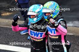 Esteban Ocon (FRA) Alpine F1 Team (Right) and Pierre Gasly (FRA) Alpine F1 Team celebrate a 2-3 finish in parc ferme. 03.11.2024. Formula 1 World Championship, Rd 21, Brazilian Grand Prix, Sao Paulo, Brazil, Race Day.