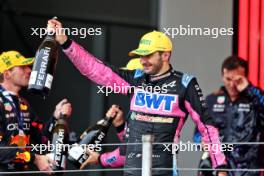 Esteban Ocon (FRA) Alpine F1 Team celebrates his second position on the podium. 03.11.2024. Formula 1 World Championship, Rd 21, Brazilian Grand Prix, Sao Paulo, Brazil, Race Day.