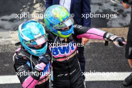 Esteban Ocon (FRA) Alpine F1 Team (Right) and Pierre Gasly (FRA) Alpine F1 Team celebrate a 2-3 finish in parc ferme. 03.11.2024. Formula 1 World Championship, Rd 21, Brazilian Grand Prix, Sao Paulo, Brazil, Race Day.