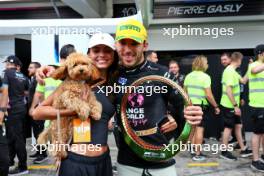 Pierre Gasly (FRA) Alpine F1 Team celebrates his third place finish with his girlfriend Kika Cerqueira Gomes (POR). 03.11.2024. Formula 1 World Championship, Rd 21, Brazilian Grand Prix, Sao Paulo, Brazil, Race Day.