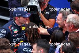 Race winner Max Verstappen (NLD) Red Bull Racing with Christian Horner (GBR) Red Bull Racing Team Principal in parc ferme. 03.11.2024. Formula 1 World Championship, Rd 21, Brazilian Grand Prix, Sao Paulo, Brazil, Race Day.