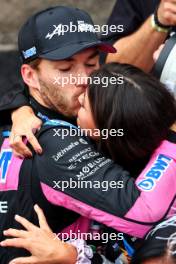 Pierre Gasly (FRA) Alpine F1 Team celebrates his third position with girlfriend Kika Cerqueira Gomes (POR) in parc ferme. 03.11.2024. Formula 1 World Championship, Rd 21, Brazilian Grand Prix, Sao Paulo, Brazil, Race Day.