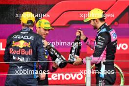 (L to R): Pierre Gasly (FRA) Alpine F1 Team celebrates his third position with second placed team mate Esteban Ocon (FRA) Alpine F1 Team on the podium. 03.11.2024. Formula 1 World Championship, Rd 21, Brazilian Grand Prix, Sao Paulo, Brazil, Race Day.