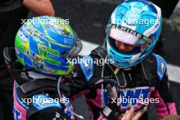 (L to R): Esteban Ocon (FRA) Alpine F1 Team and Pierre Gasly (FRA) Alpine F1 Team celebrate a 2-3 finish in parc ferme. 03.11.2024. Formula 1 World Championship, Rd 21, Brazilian Grand Prix, Sao Paulo, Brazil, Race Day.