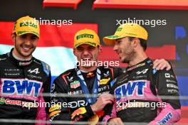 The podium (L to R): Esteban Ocon (FRA) Alpine F1 Team, second; Max Verstappen (NLD) Red Bull Racing, race winner; Pierre Gasly (FRA) Alpine F1 Team, third. 03.11.2024. Formula 1 World Championship, Rd 21, Brazilian Grand Prix, Sao Paulo, Brazil, Race Day.