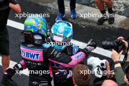 (L to R): Esteban Ocon (FRA) Alpine F1 Team and Pierre Gasly (FRA) Alpine F1 Team celebrate a 2-3 finish in parc ferme. 03.11.2024. Formula 1 World Championship, Rd 21, Brazilian Grand Prix, Sao Paulo, Brazil, Race Day.