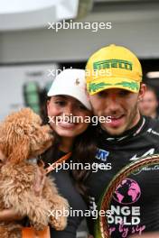 Pierre Gasly (FRA) Alpine F1 Team celebrates his third position with his girlfriend Kika Cerqueira Gomes (POR). 03.11.2024. Formula 1 World Championship, Rd 21, Brazilian Grand Prix, Sao Paulo, Brazil, Race Day.