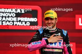 Esteban Ocon (FRA) Alpine F1 Team celebrates his second position on the podium. 03.11.2024. Formula 1 World Championship, Rd 21, Brazilian Grand Prix, Sao Paulo, Brazil, Race Day.