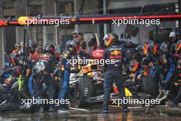 Sergio Perez (MEX) Red Bull Racing RB20 makes a pit stop. 03.11.2024. Formula 1 World Championship, Rd 21, Brazilian Grand Prix, Sao Paulo, Brazil, Race Day.