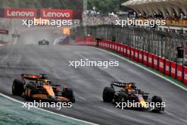 Oscar Piastri (AUS) McLaren MCL38 and Max Verstappen (NLD) Red Bull Racing RB20 battle for position. 03.11.2024. Formula 1 World Championship, Rd 21, Brazilian Grand Prix, Sao Paulo, Brazil, Race Day.