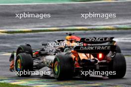 Oscar Piastri (AUS) McLaren MCL38 and Max Verstappen (NLD) Red Bull Racing RB20 battle for position. 03.11.2024. Formula 1 World Championship, Rd 21, Brazilian Grand Prix, Sao Paulo, Brazil, Race Day.