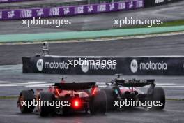 Charles Leclerc (MON) Ferrari SF-24 and Esteban Ocon (FRA) Alpine F1 Team A524 battle for position. 03.11.2024. Formula 1 World Championship, Rd 21, Brazilian Grand Prix, Sao Paulo, Brazil, Race Day.