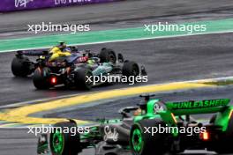 Lewis Hamilton (GBR) Mercedes AMG F1 W15 and Franco Colapinto (ARG) Williams Racing FW46 battle for position. 03.11.2024. Formula 1 World Championship, Rd 21, Brazilian Grand Prix, Sao Paulo, Brazil, Race Day.