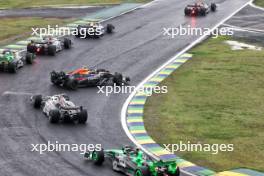 Sergio Perez (MEX) Red Bull Racing RB20 spins at the start of the race. 03.11.2024. Formula 1 World Championship, Rd 21, Brazilian Grand Prix, Sao Paulo, Brazil, Race Day.