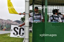 Circuit atmosphere - marshals with yellow flag and Safety Car Board. 03.11.2024. Formula 1 World Championship, Rd 21, Brazilian Grand Prix, Sao Paulo, Brazil, Race Day.