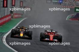 Max Verstappen (NLD) Red Bull Racing RB20 and Charles Leclerc (MON) Ferrari SF-24 battle for position. 03.11.2024. Formula 1 World Championship, Rd 21, Brazilian Grand Prix, Sao Paulo, Brazil, Race Day.