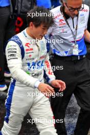 Yuki Tsunoda (JPN) RB and Laurent Mekies (FRA) RB Technical Director in the pits while the race is red flagged. 03.11.2024. Formula 1 World Championship, Rd 21, Brazilian Grand Prix, Sao Paulo, Brazil, Race Day.