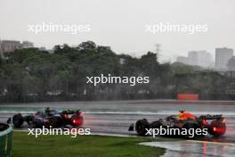 Esteban Ocon (FRA) Alpine F1 Team A524 leads Max Verstappen (NLD) Red Bull Racing RB20. 03.11.2024. Formula 1 World Championship, Rd 21, Brazilian Grand Prix, Sao Paulo, Brazil, Race Day.