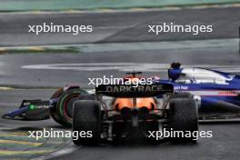 Liam Lawson (NZL) RB VCARB 01 and Oscar Piastri (AUS) McLaren MCL38 battle for position. 03.11.2024. Formula 1 World Championship, Rd 21, Brazilian Grand Prix, Sao Paulo, Brazil, Race Day.