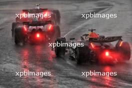 Esteban Ocon (FRA) Alpine F1 Team A524 leads Max Verstappen (NLD) Red Bull Racing RB20. 03.11.2024. Formula 1 World Championship, Rd 21, Brazilian Grand Prix, Sao Paulo, Brazil, Race Day.