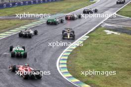 Sergio Perez (MEX) Red Bull Racing RB20 spins at the start of the race. 03.11.2024. Formula 1 World Championship, Rd 21, Brazilian Grand Prix, Sao Paulo, Brazil, Race Day.