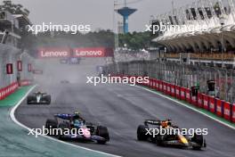 Pierre Gasly (FRA) Alpine F1 Team A524 and Max Verstappen (NLD) Red Bull Racing RB20 battle for position. 03.11.2024. Formula 1 World Championship, Rd 21, Brazilian Grand Prix, Sao Paulo, Brazil, Race Day.