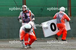 Marshals clear debris from the circuit. 03.11.2024. Formula 1 World Championship, Rd 21, Brazilian Grand Prix, Sao Paulo, Brazil, Race Day.