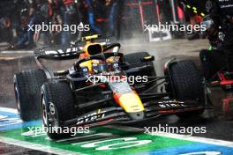 Sergio Perez (MEX) Red Bull Racing RB20 makes a pit stop. 03.11.2024. Formula 1 World Championship, Rd 21, Brazilian Grand Prix, Sao Paulo, Brazil, Race Day.