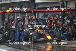 Sergio Perez (MEX) Red Bull Racing RB20 makes a pit stop. 03.11.2024. Formula 1 World Championship, Rd 21, Brazilian Grand Prix, Sao Paulo, Brazil, Race Day.