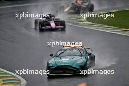 Esteban Ocon (FRA) Alpine F1 Team A524 leads behind the Aston Martin FIA Safety Car. 03.11.2024. Formula 1 World Championship, Rd 21, Brazilian Grand Prix, Sao Paulo, Brazil, Race Day.