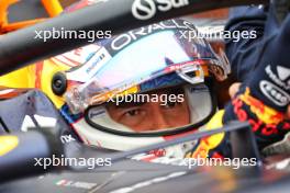 Sergio Perez (MEX) Red Bull Racing RB20 in the pits while the race is red flagged. 03.11.2024. Formula 1 World Championship, Rd 21, Brazilian Grand Prix, Sao Paulo, Brazil, Race Day.