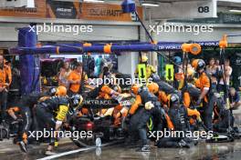 Lando Norris (GBR) McLaren MCL38 makes a pit stop. 03.11.2024. Formula 1 World Championship, Rd 21, Brazilian Grand Prix, Sao Paulo, Brazil, Race Day.